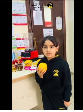 Watch as first graders practice their English skills