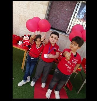 نشاط اللون الأحمر مع طلاب القيروان