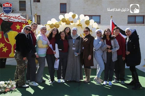 جانب من تكريم طالباتنا المميزات والمتفوقات في القسم الأساسي- بنات في النظام الوطني.