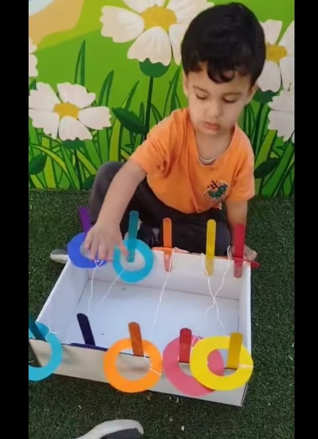 Our kids learned about colors and matched the rings with the sticks